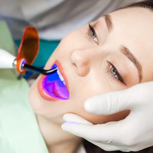 Patient receiving cosmetic dental bonding