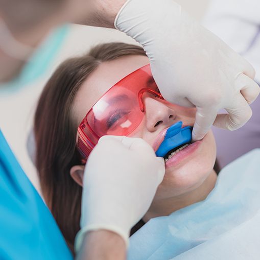 Patient receiving fluoride treatment