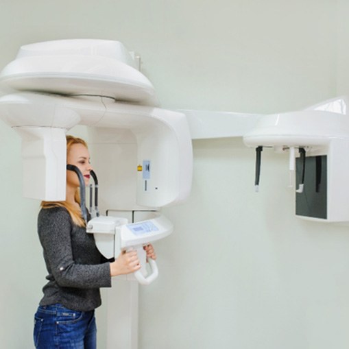 patient getting images taken with the cone beam CT scanner