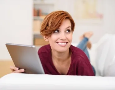 Woman with healthy smile after periodontal therapy