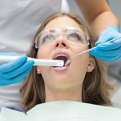 Dentist capturing intraoral images