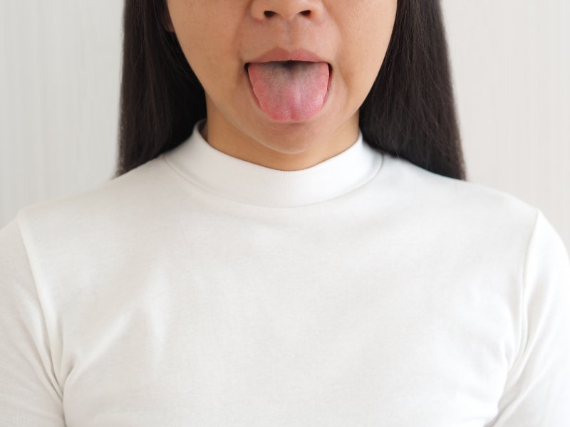 woman sticking out her tongue 