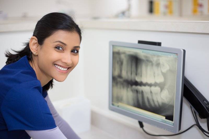 portrait of a smiling dental assistant