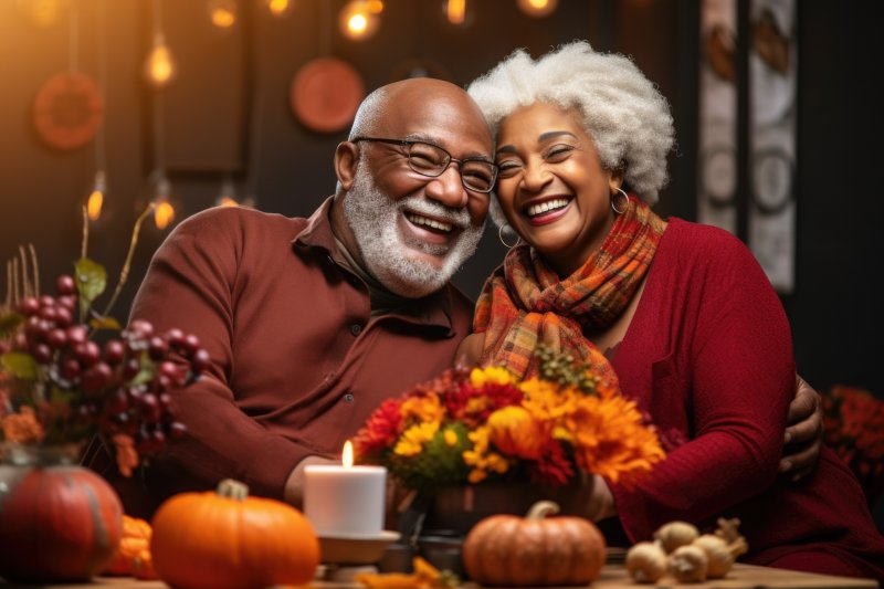 older couple smiling and celebrating Thanksgiving 