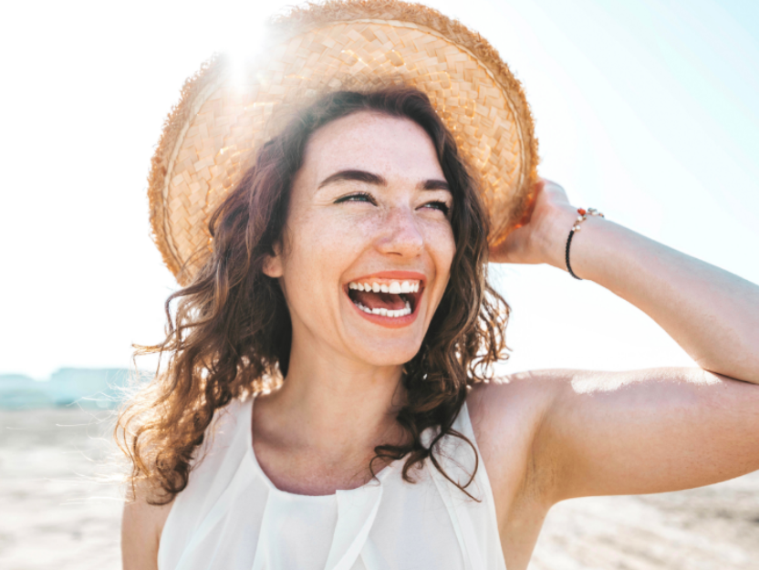 Woman smiling on beach